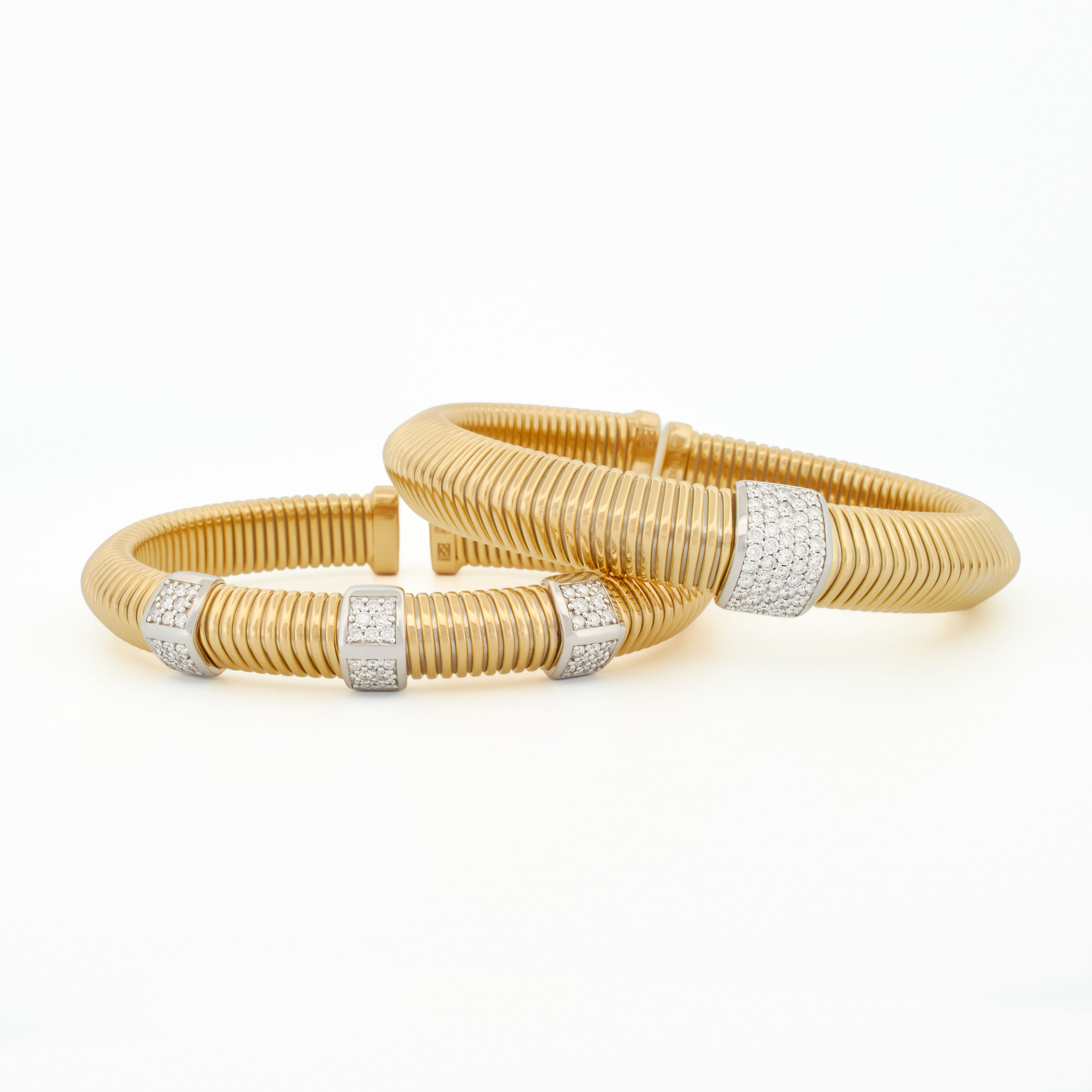 Luxurious Tubogas Bangle with Three Diamond Pavé Stations
