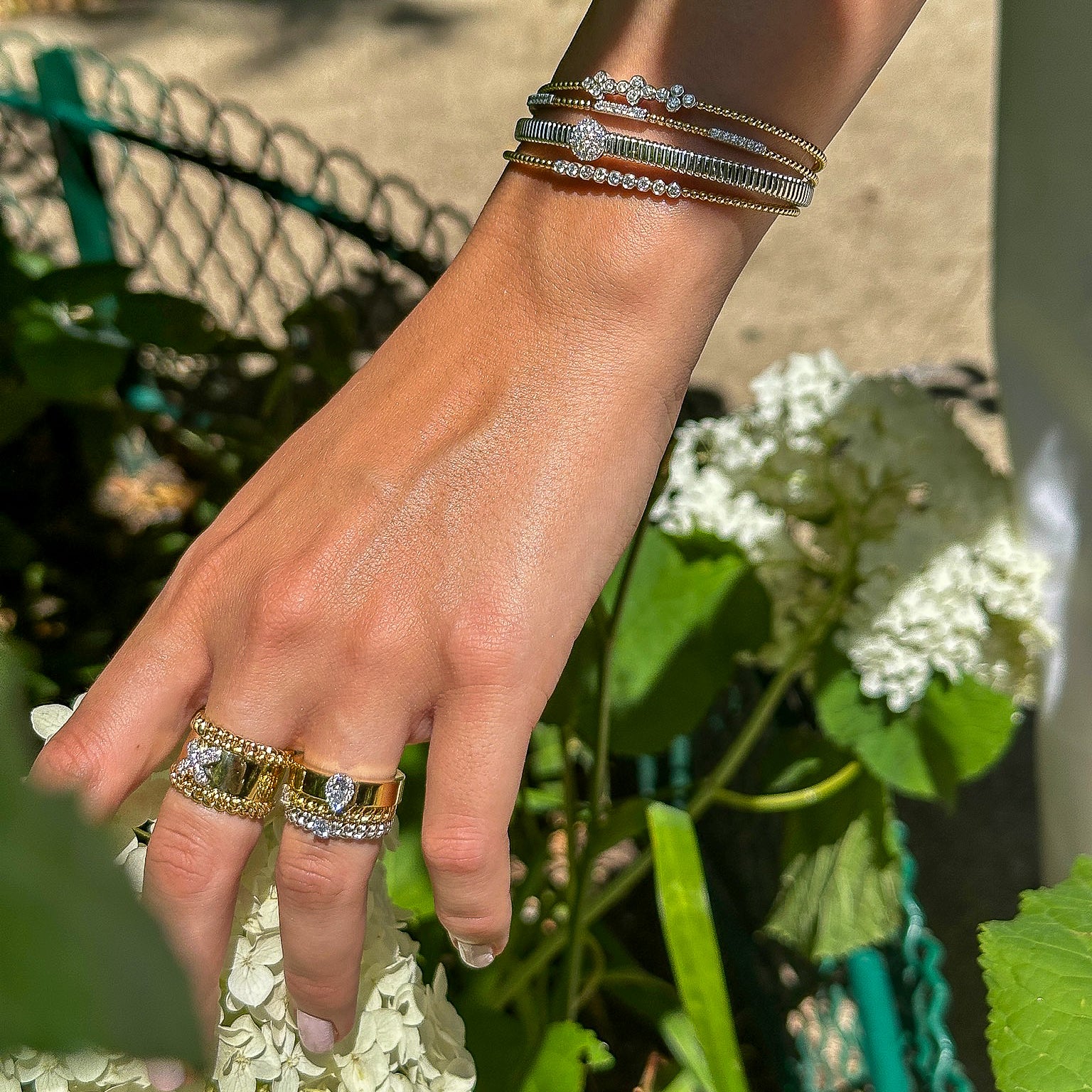 Ring with Chain Accents and Criss-Cross Pavé Diamond Center