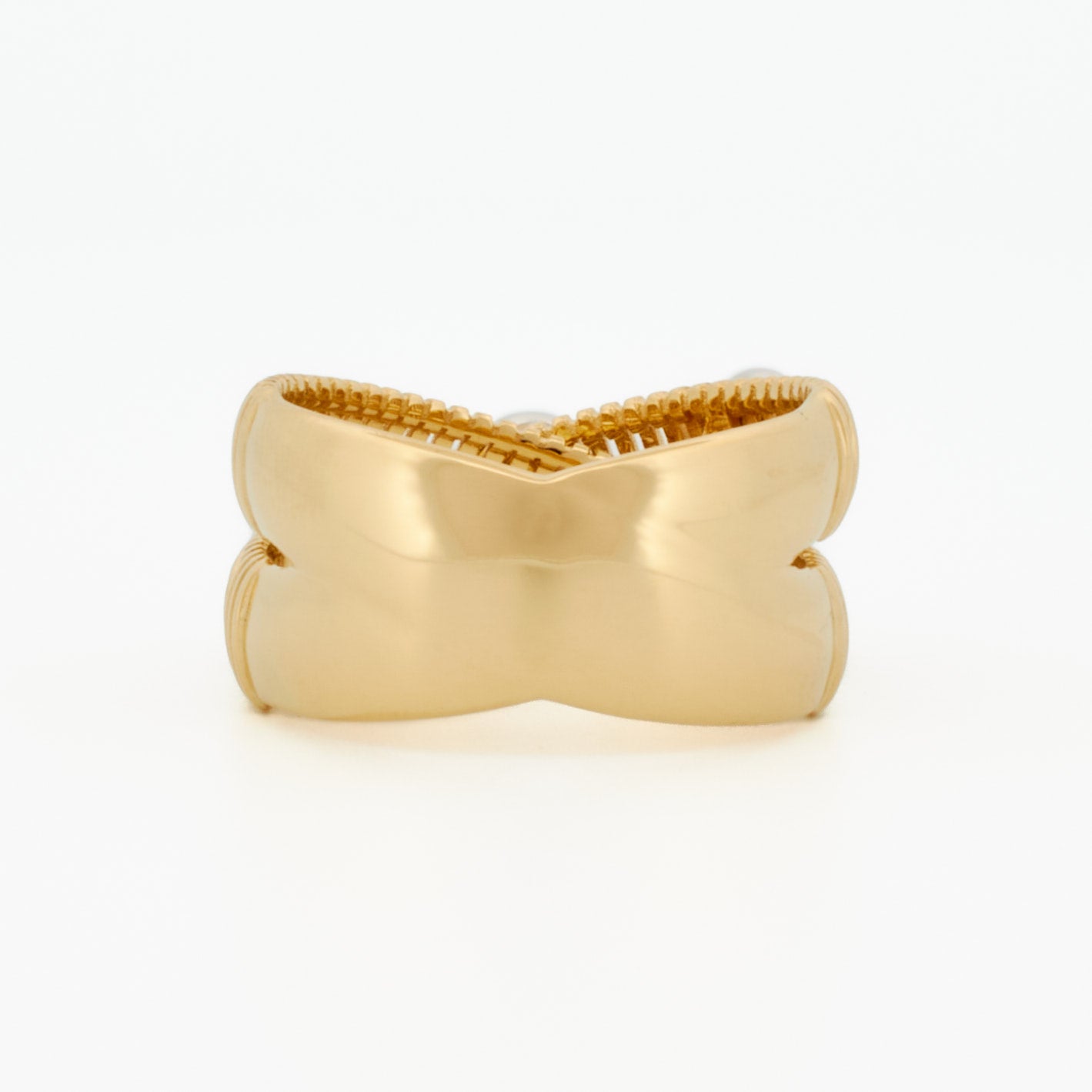 Stunning Crossover Ring with Diamond Cluster Accents